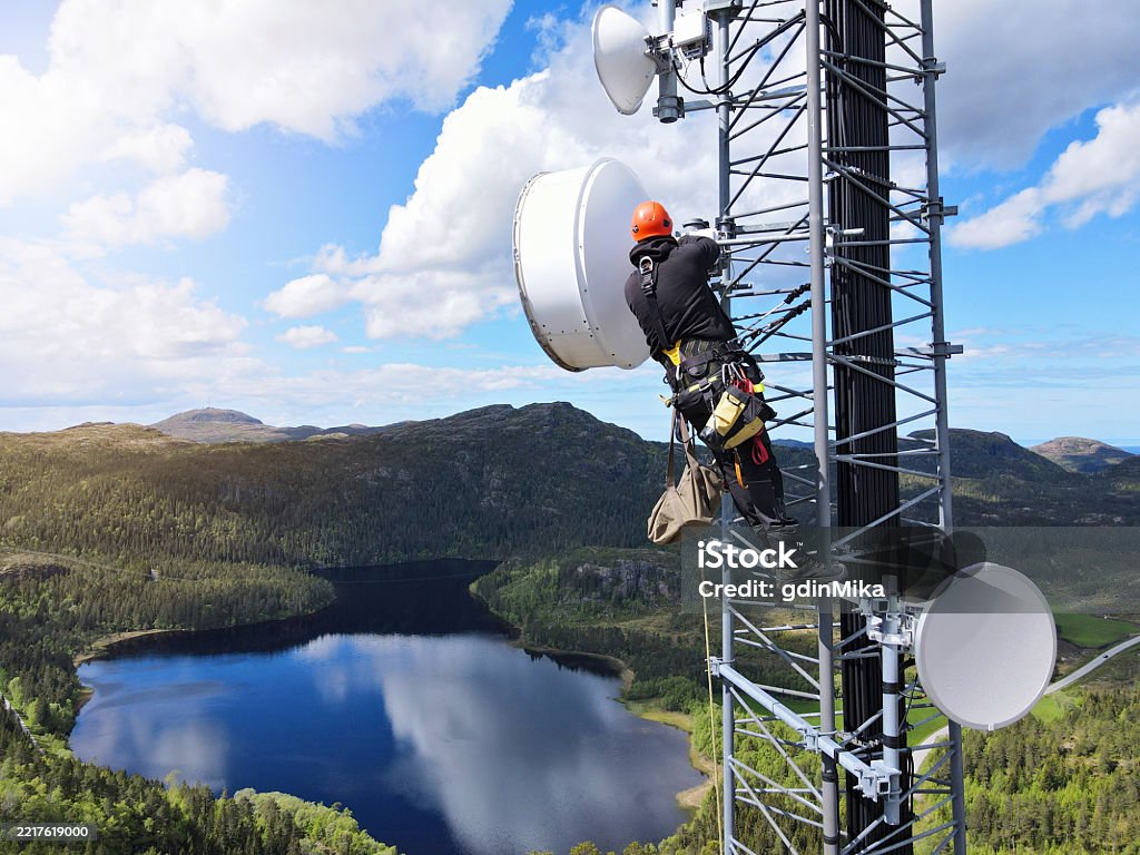 Technician on communications tower